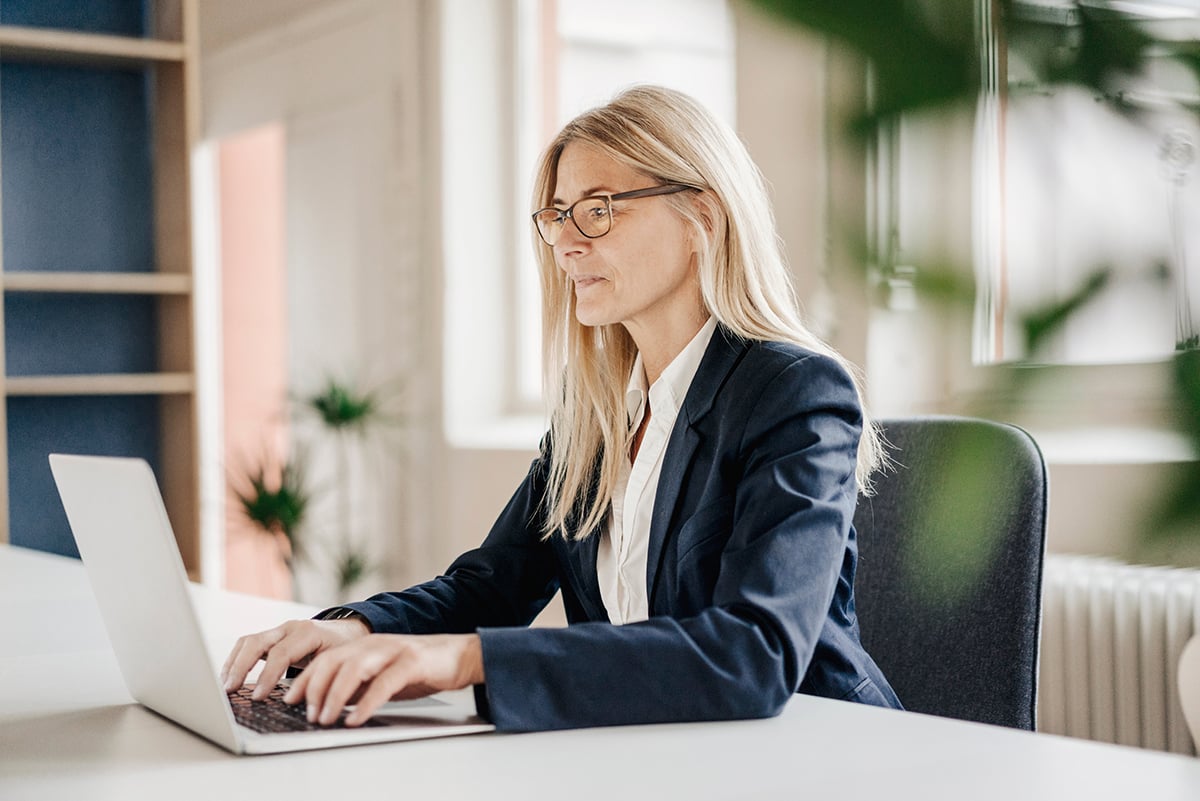 Lady with laptop using occupational lenses